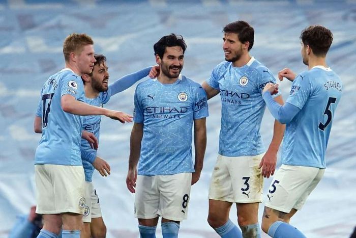 Ilkay Gundogan (centre)struck Man City's second  goal in a comfortable win over Crystal Palace