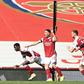 Arsenal striker Eddie Nketiah (L) celebrates scoring against Fulham