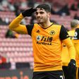 Wolves' Pedro Neto (L) celebrates after scoring at Southampton