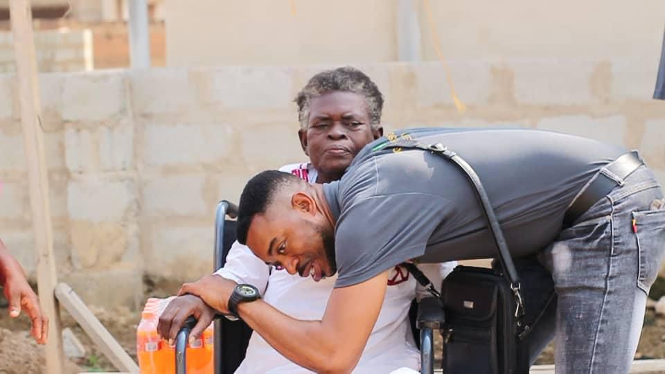 Lance Corporal Simon Agbeko gives to the aged