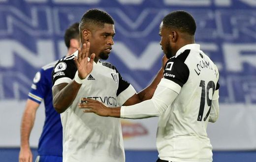 Fulham's Ivan Cavaleiro (L) celebrates with Ademola Lookman