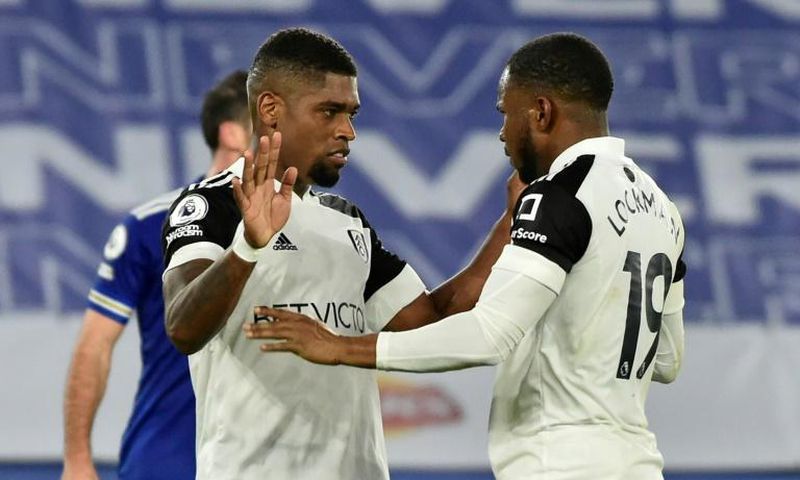 Fulham's Ivan Cavaleiro (L) celebrates with Ademola Lookman