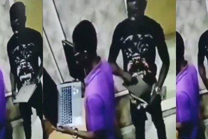 Man steals and hides a whole laptop into his trouser inside a shop