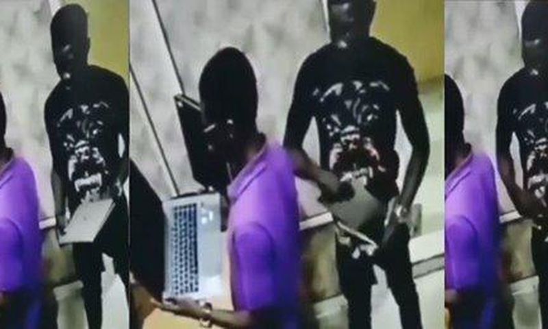 Man steals and hides a whole laptop into his trouser inside a shop