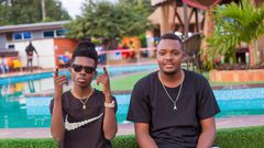 Strongman with his manager