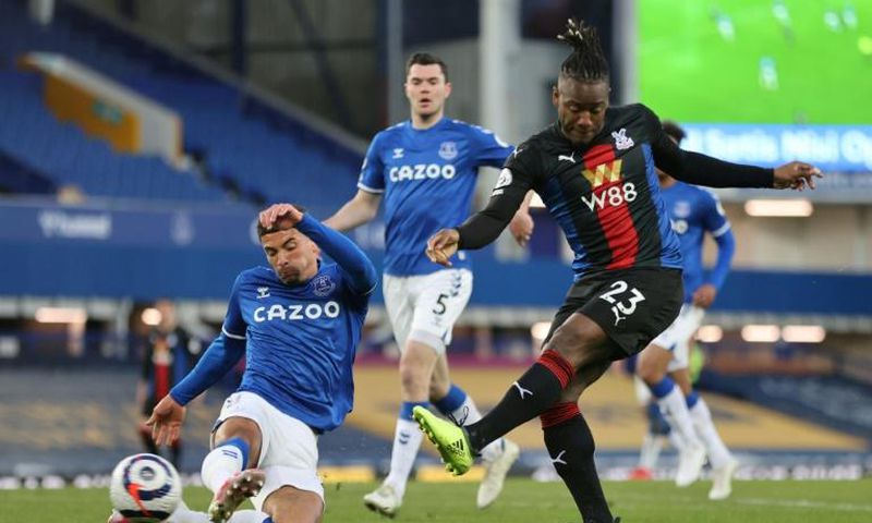 Bat man: Michy Batshuayi (right)dealt a blow to Everton's European hopes with a late equaliser for Crystal Palace