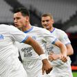 Dimitri Payet celebrates with Florian Thauvin and Michael Cuisance after scoring in Marseille's 3-1 win over Nantes