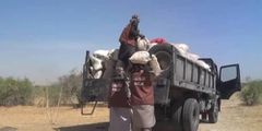 Boko Haram members distribute food to residents of Nigeria’s Borno & Yobe states
