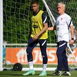 France striker Kylian Mbappe (L) and coach Didier Deschamps (R) prepare for Tuesday's Euro 2020 clash with Germany