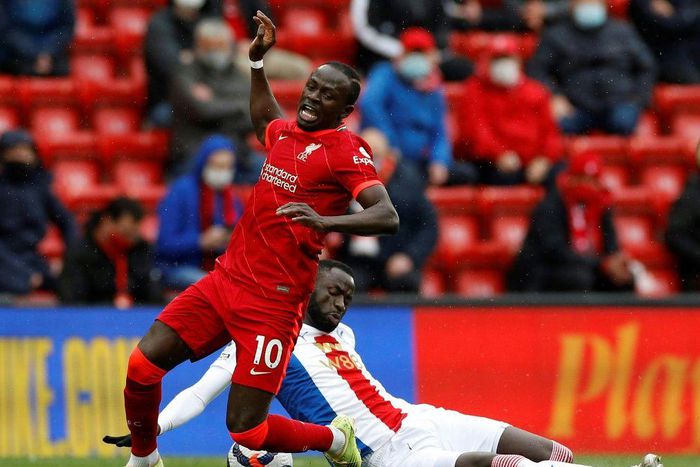 Liverpool forward Sadio Mane (L) is fouled by Crystal Palace midfielder and fellow Senegalese Cheikhou Kouyate at Anfield.