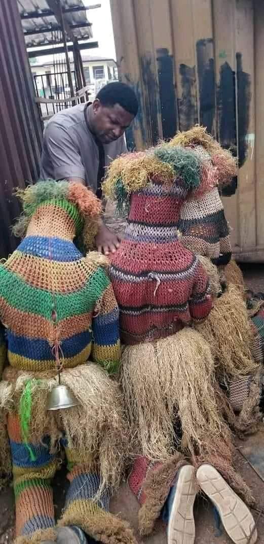 Masquerades kneel as pastor prays for them in public