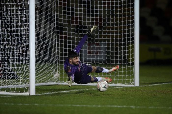 Newport County's goalkeeper Tom King in action