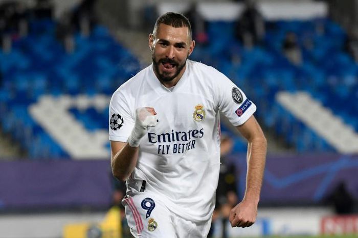 Karim Benzema's brace sent Real Madrid into the last 16 of the Champions League