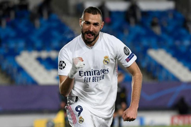 Karim Benzema's brace sent Real Madrid into the last 16 of the Champions League