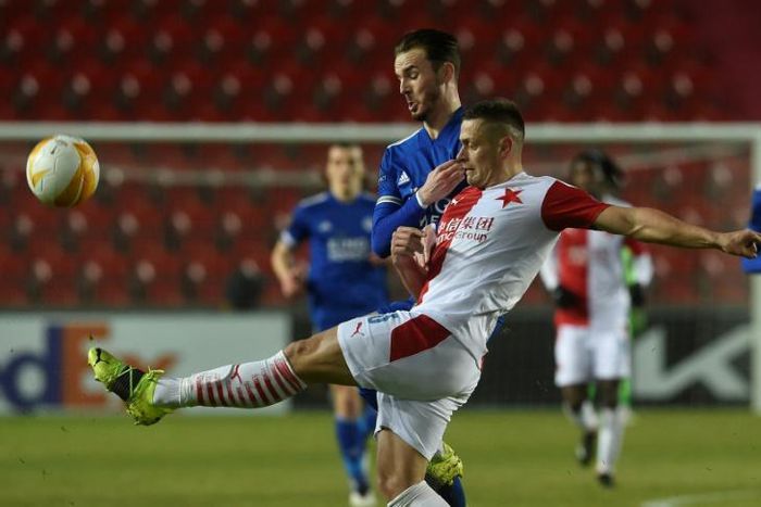 Stalemate: Slavia Prague defender Tomas Holes and Leicester's James Maddison vie for the ball