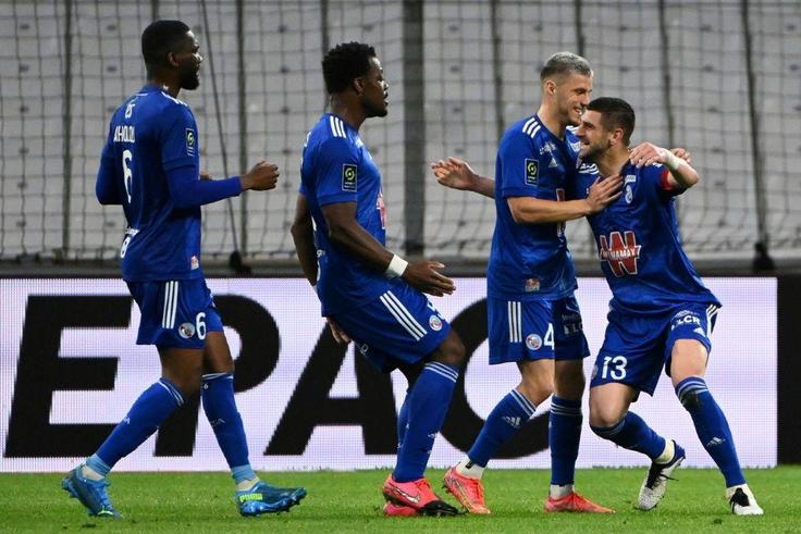 Great strike: Strasbourg's Serbian defender Stefan Mitrovic puts his team ahead