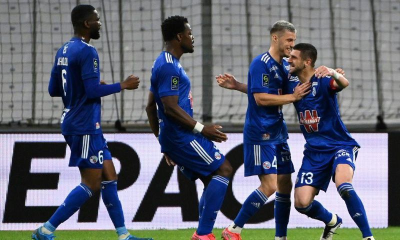 Great strike: Strasbourg's Serbian defender Stefan Mitrovic puts his team ahead