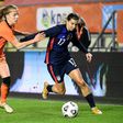 United States forward Tobin Heath (R)