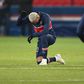 Neymar taking a knee before the match restarted. He went on to score a hat-trick for PSG in their 5-1 win