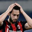 AC Milan's Turkish midfielder Hakan Calhanoglu reacts during the Italian Serie A football match Lazio vs Ac Milan at Olympic stadium in Rome on April 26, 2021.