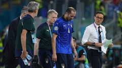 Italy captain Chiellini leaves the pitch injured in Rome