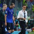 Italy captain Chiellini leaves the pitch injured in Rome