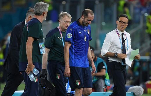 Italy captain Chiellini leaves the pitch injured in Rome