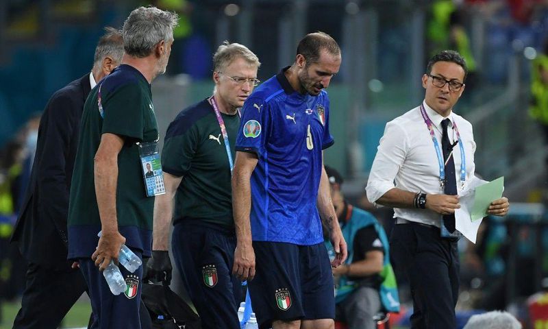 Italy captain Chiellini leaves the pitch injured in Rome