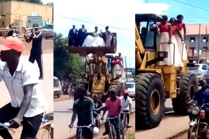 Newly wedded couple cruise in excavator as bicycle riders lead them home