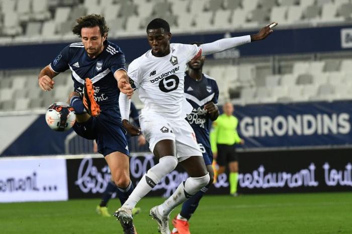 US international Timothy Weah (R) scored Lille's second goal in Bordeaux