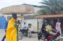 Archbishop Samson Benjamin embarks on a one-man protest with a coffin on his head
