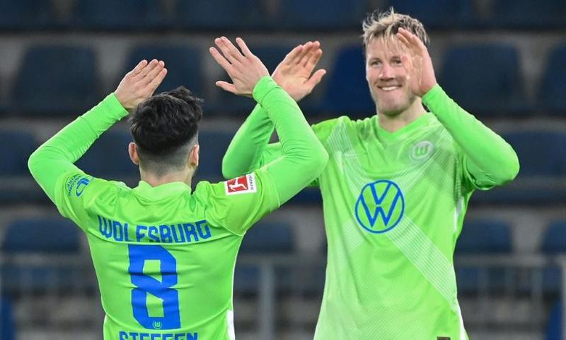 Two strikes: Wolfsburg midfielder Renato Steffen (left) celebrates scoring
