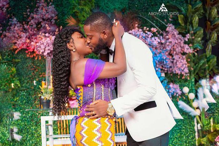 Abena Moet and husband share kiss during their wedding
