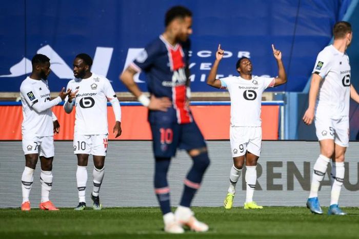 Lille forward Jonathan David (2R) celebrates after scoring his team's winner against Ligue 1 title rivals PSG last weekend