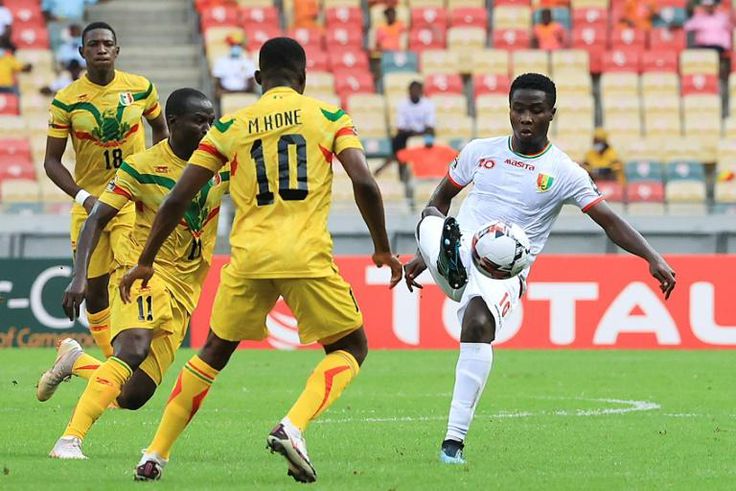 Guinea midfielder Sylla (R) scored first in a 2-0 win over hosts Cameroon