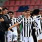 Juventus forward Paulo Dybala (C) and Alvaro Morata (2ndL) celebrate after booking a Champions League berth.