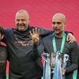 Manchester City manager Pep Guardiola (2nd R) and his coaches