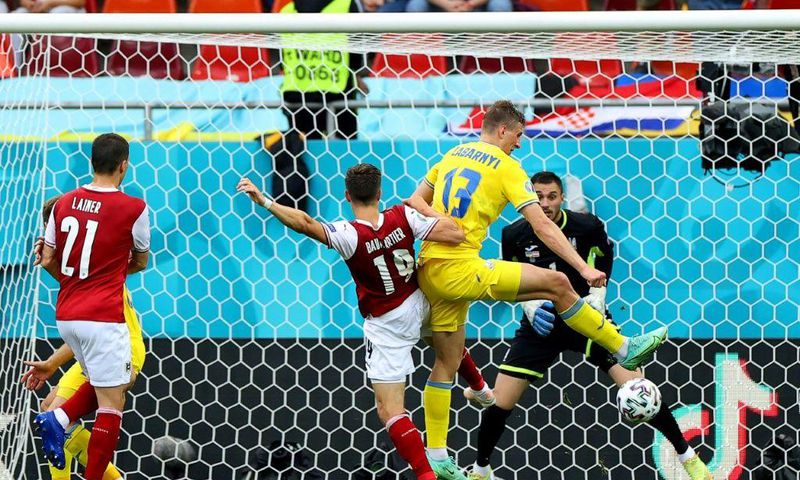 Christoph Baumgartner (C) scored the goal that put Austria into the last 16 at Euro 2020
