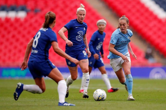 Chelsea striker Bethany England (centre) believes English clubs can become a dominant force in the women's Champions League