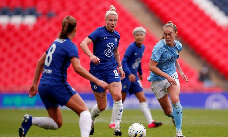 Chelsea striker Bethany England (centre) believes English clubs can become a dominant force in the women's Champions League