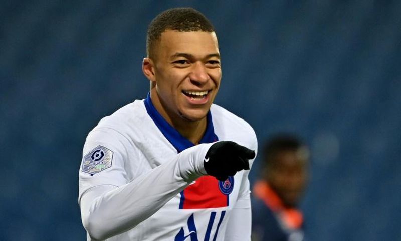 Kylian Mbappe (R) scored his 100th goal for PSG on his 137th appearace for the club