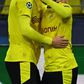 Jadon Sancho (R) celebrates his stunning free-kick with Dortmund teammate Erling Braut Haaland