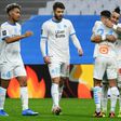 Marseille players celebrate after scoring in their 3-2 win over Nice in Ligue 1 on Wednesday