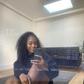 Girlfriend sitting in front of the mirror