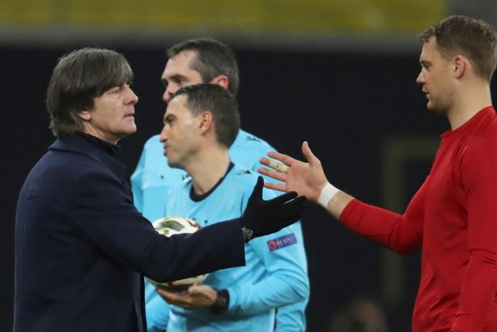 Germany captain Manuel Neuer (R) wants to send off head coach Joachim Loew (L) with sucess at the Euro 2020 finals