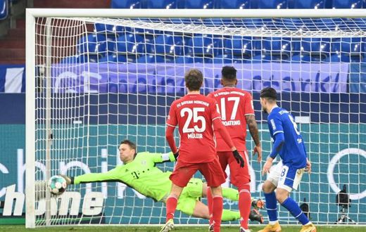 Neuer makes a save against Schalke on Sunday