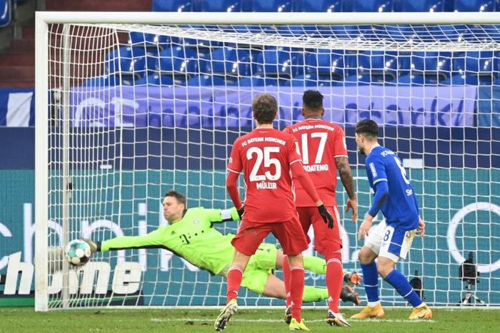 Neuer makes a save against Schalke on Sunday