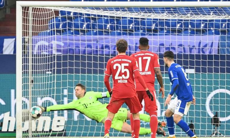 Neuer makes a save against Schalke on Sunday