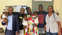 Kwaku Manu with Funny Face's family