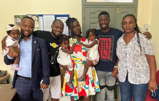 Kwaku Manu with Funny Face's family